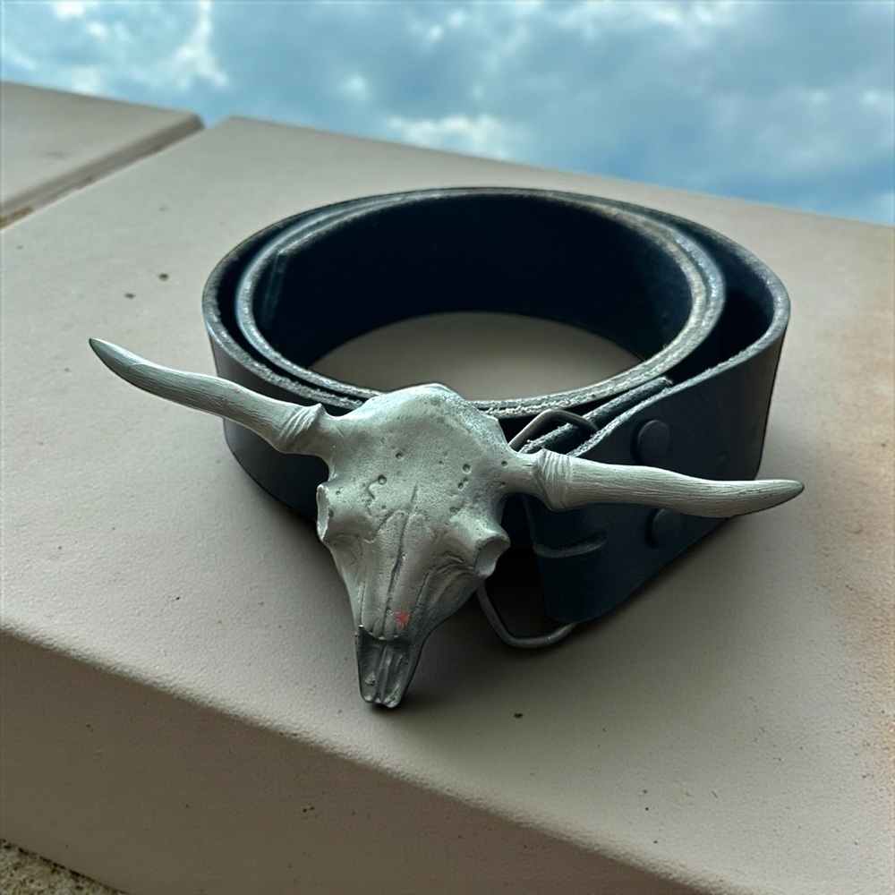 Vintage Western style longhorn belt with peg style buckle stamped 1980